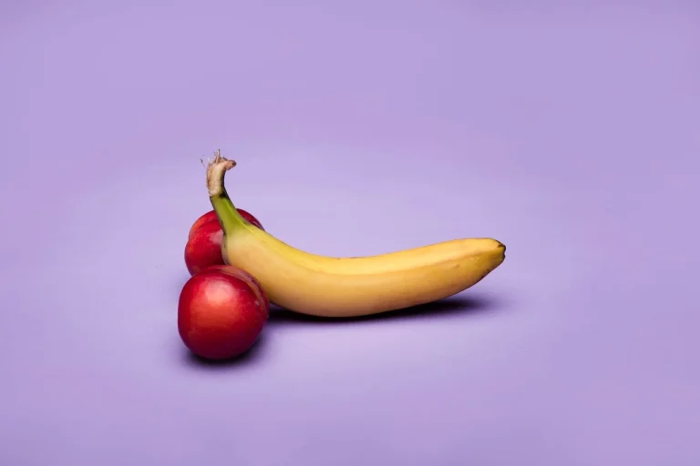 Banana and red fruit representing realistic dildo buying guide in Malaysia